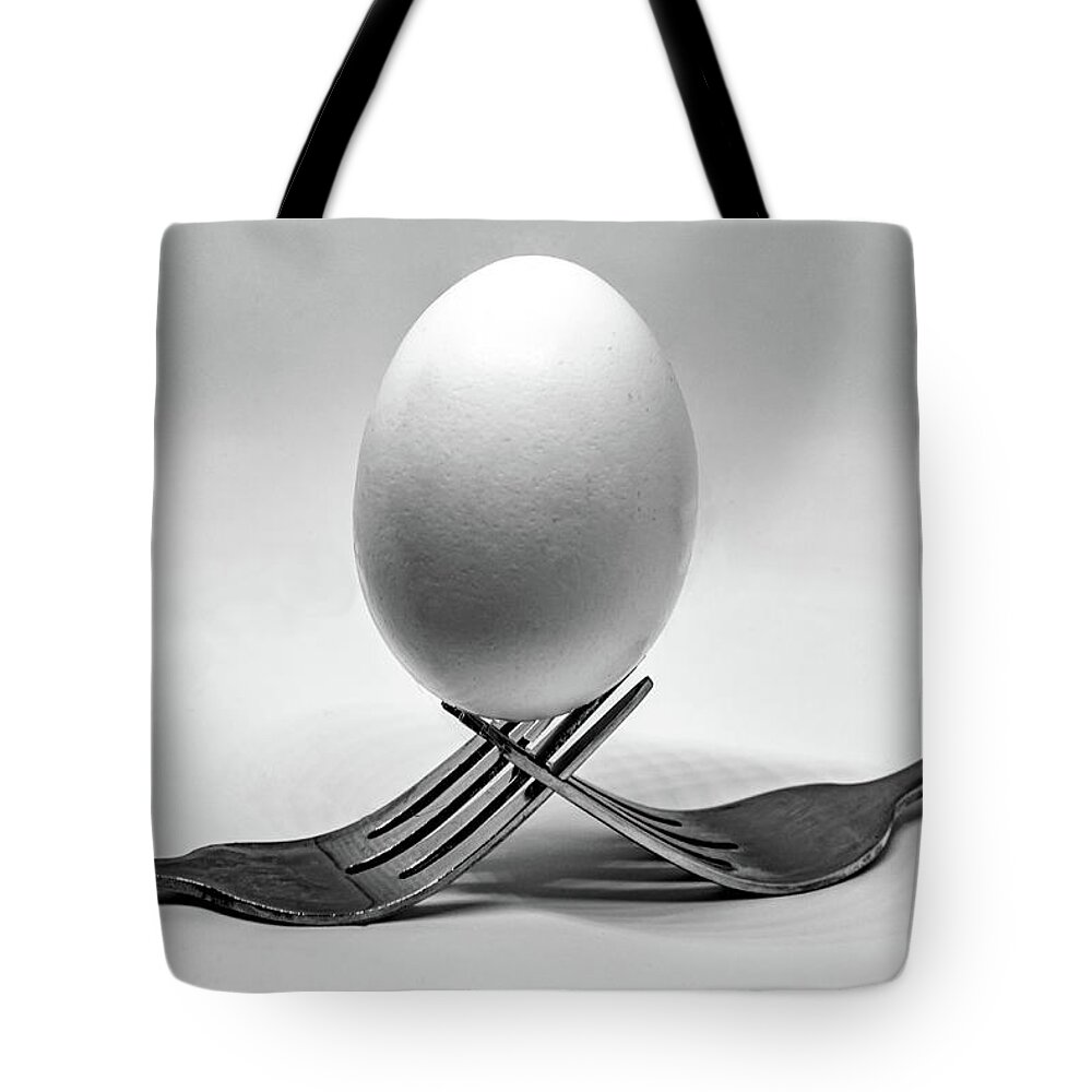 Egg Tote Bag featuring the photograph Forking Egg on White by Kevin Anderson