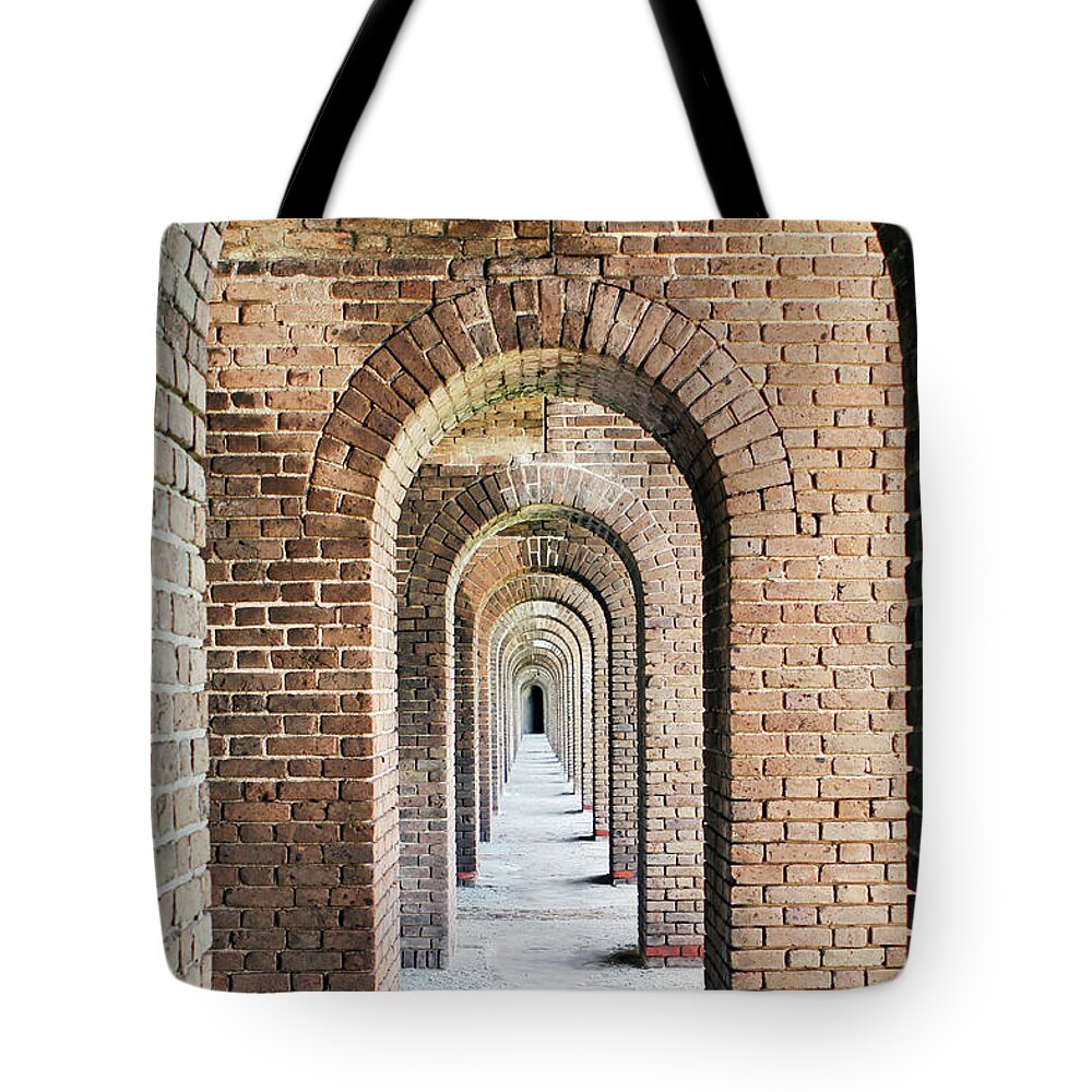 Arches; Fort Jefferson; Entryway; Doorway; Brick; Bricks; Fort; Civil War; Prison; Dry Tortugas; Key West; National Park; Park; Repetition; Perspective; Red; Gray; Vertical; Architecture; Tote Bag featuring the photograph Fort Jefferson Arches by Tina Uihlein