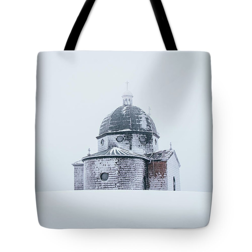 Radhost Tote Bag featuring the photograph Frozen historical chapel - White colour by Vaclav Sonnek
