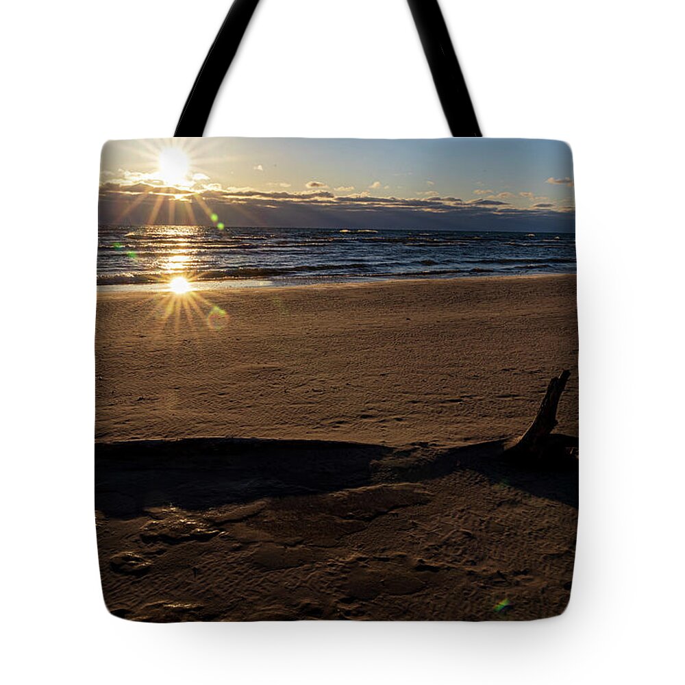 Sunrise Tote Bag featuring the photograph Frozen sand sunrise 2 by Eric Curtin