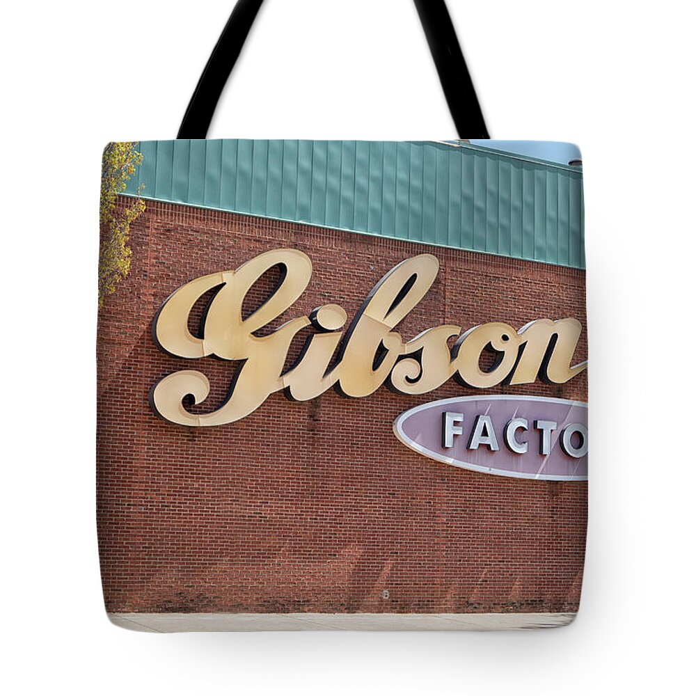 Advertising Tote Bag featuring the photograph Gibson guitar factory Memphis by Patricia Hofmeester