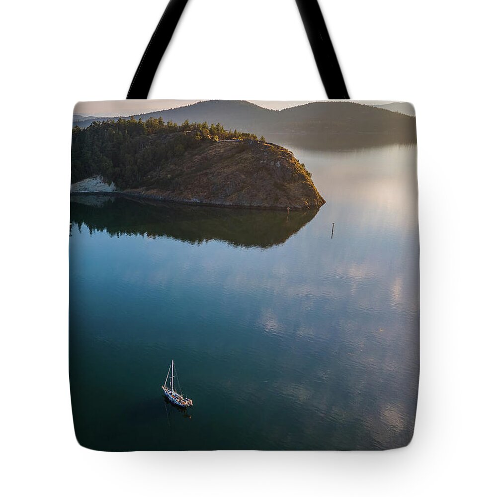 Sailboat Tote Bag featuring the photograph Glassy Calm by Michael Rauwolf