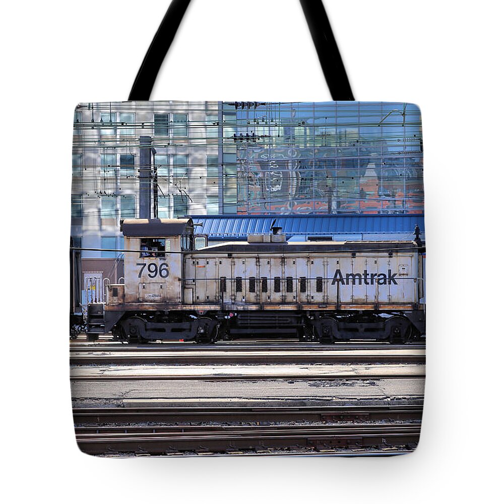 Railroad Tote Bag featuring the photograph 'Goat' Getting It Done Amidst the Glamour by Steve Ember