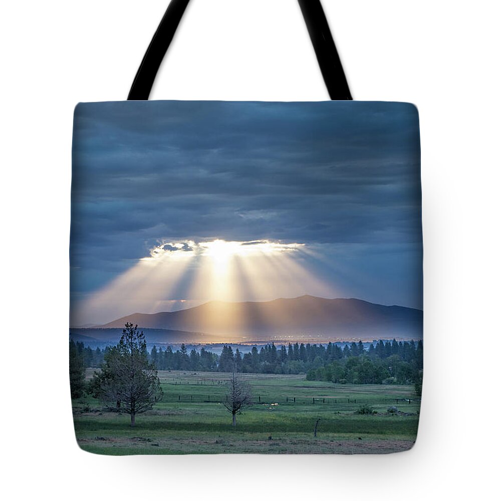 Crepuscular Tote Bag featuring the photograph God Rays by Randy Robbins