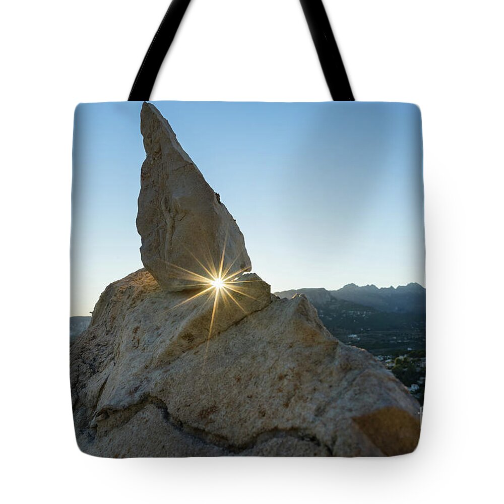 Mountain Landscape Tote Bag featuring the photograph Golden sunbeams, rocks and blue sky by Adriana Mueller