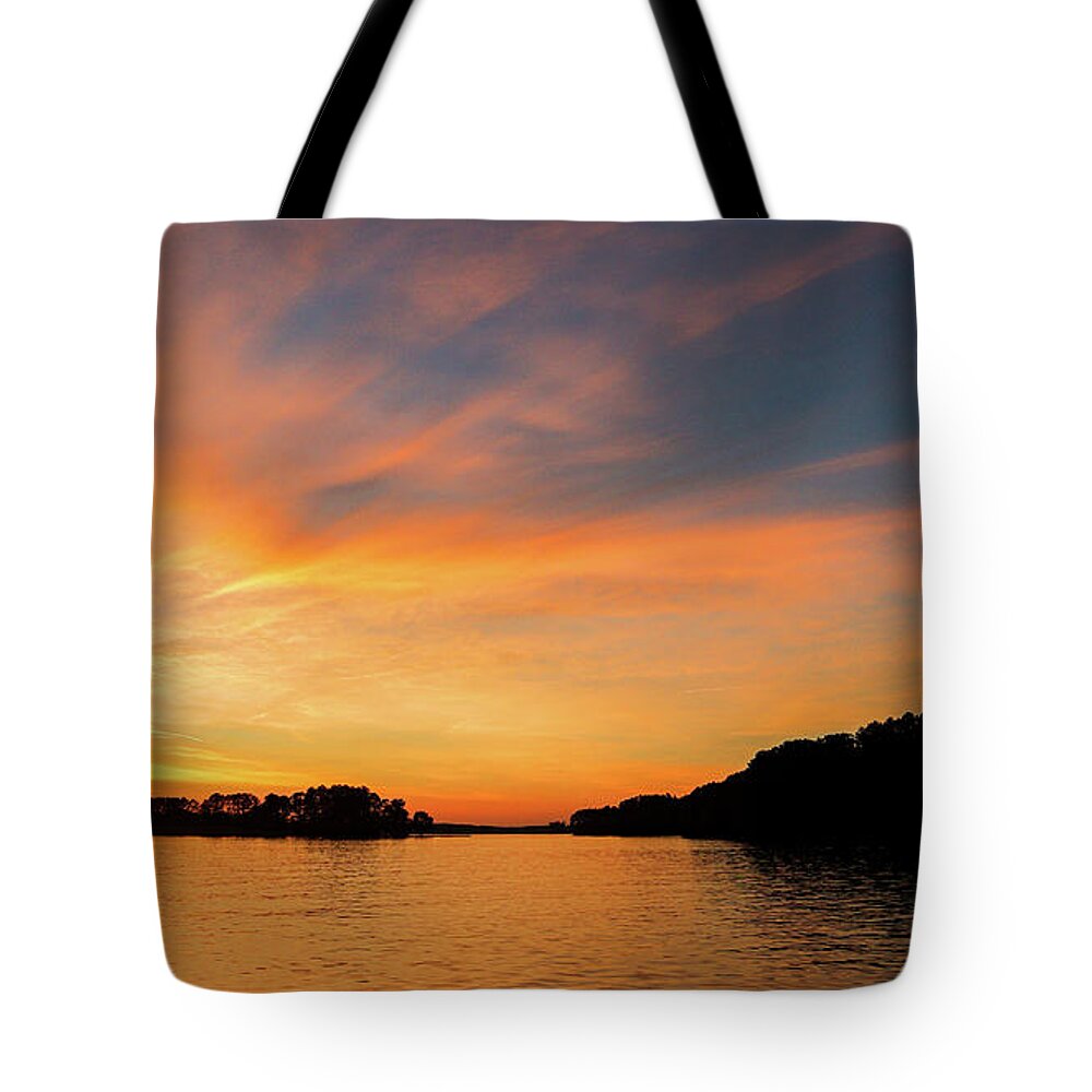 Lake Tote Bag featuring the photograph Golden Streaked Sun Skies by Ed Williams