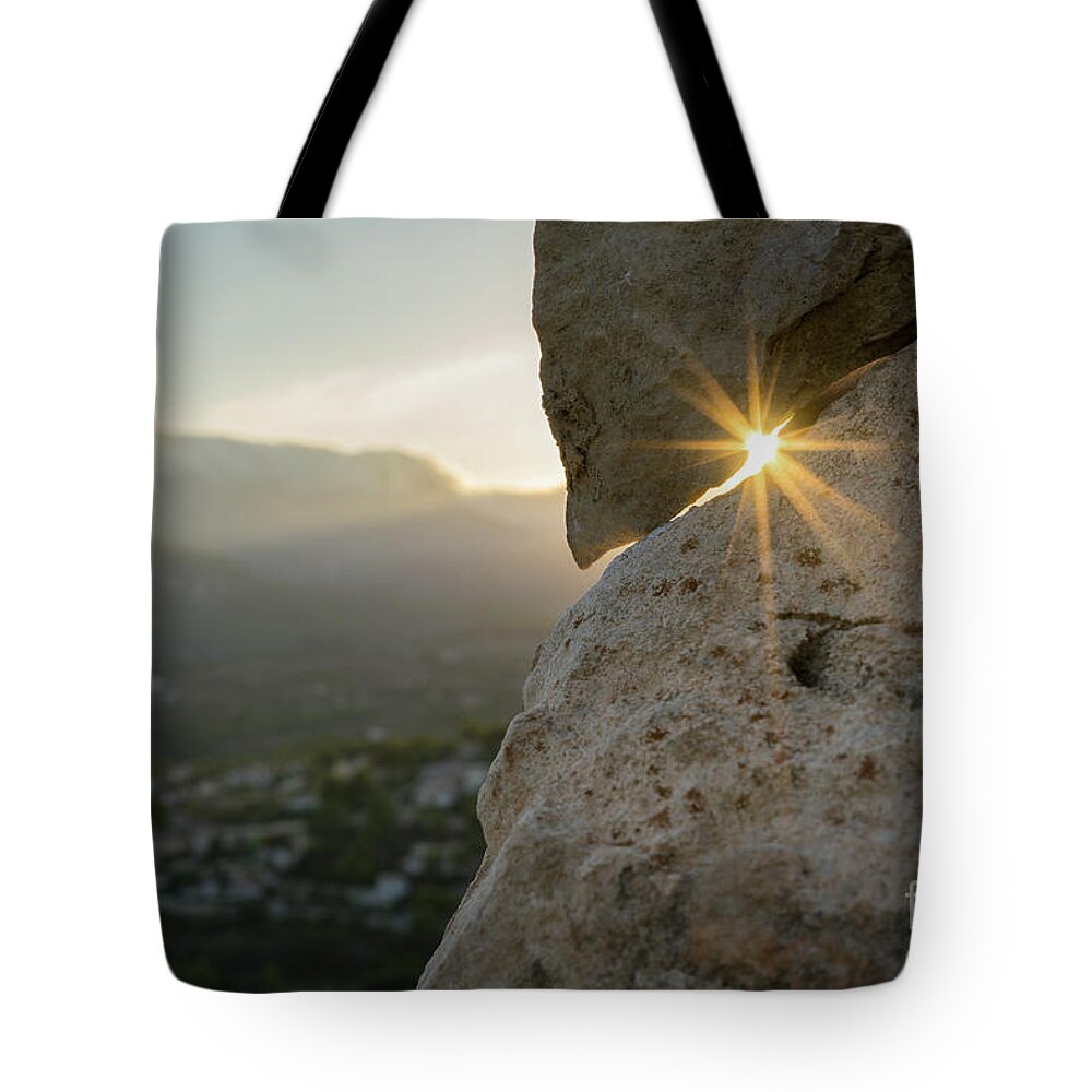 Mountains Tote Bag featuring the photograph Golden sunlight and rock at sunset by Adriana Mueller
