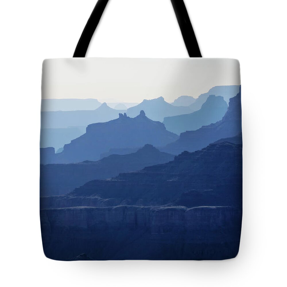 Grand Canyon Tote Bag featuring the photograph Grand Canyon blue silhouettes by Tatiana Travelways