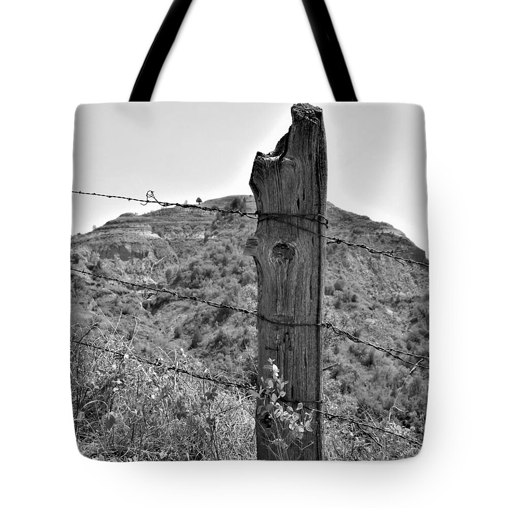 Fence Post Tote Bag featuring the photograph Grandfather's Post in Black and White by Amanda R Wright