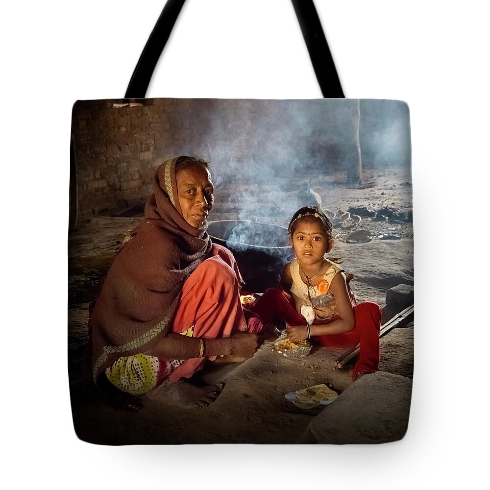 Grandma Tote Bag featuring the photograph Grandma and grand daughter by Usha Peddamatham