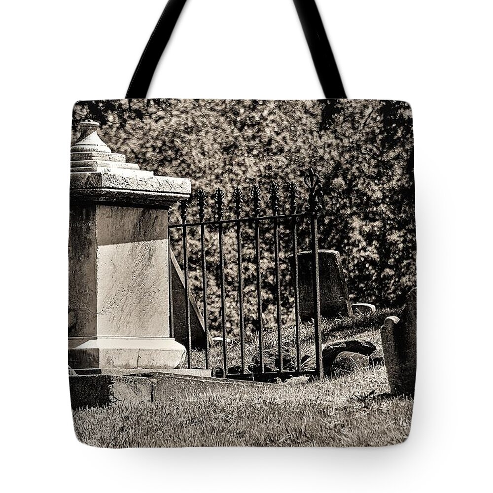 Grave Yard Metal Trees Tomb Stones B&w Tote Bag featuring the photograph Grave Yard by John Linnemeyer