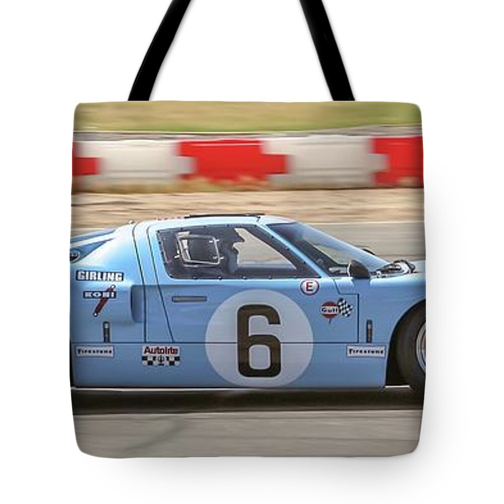 Ford Tote Bag featuring the photograph GT40 racing by Darrell Foster