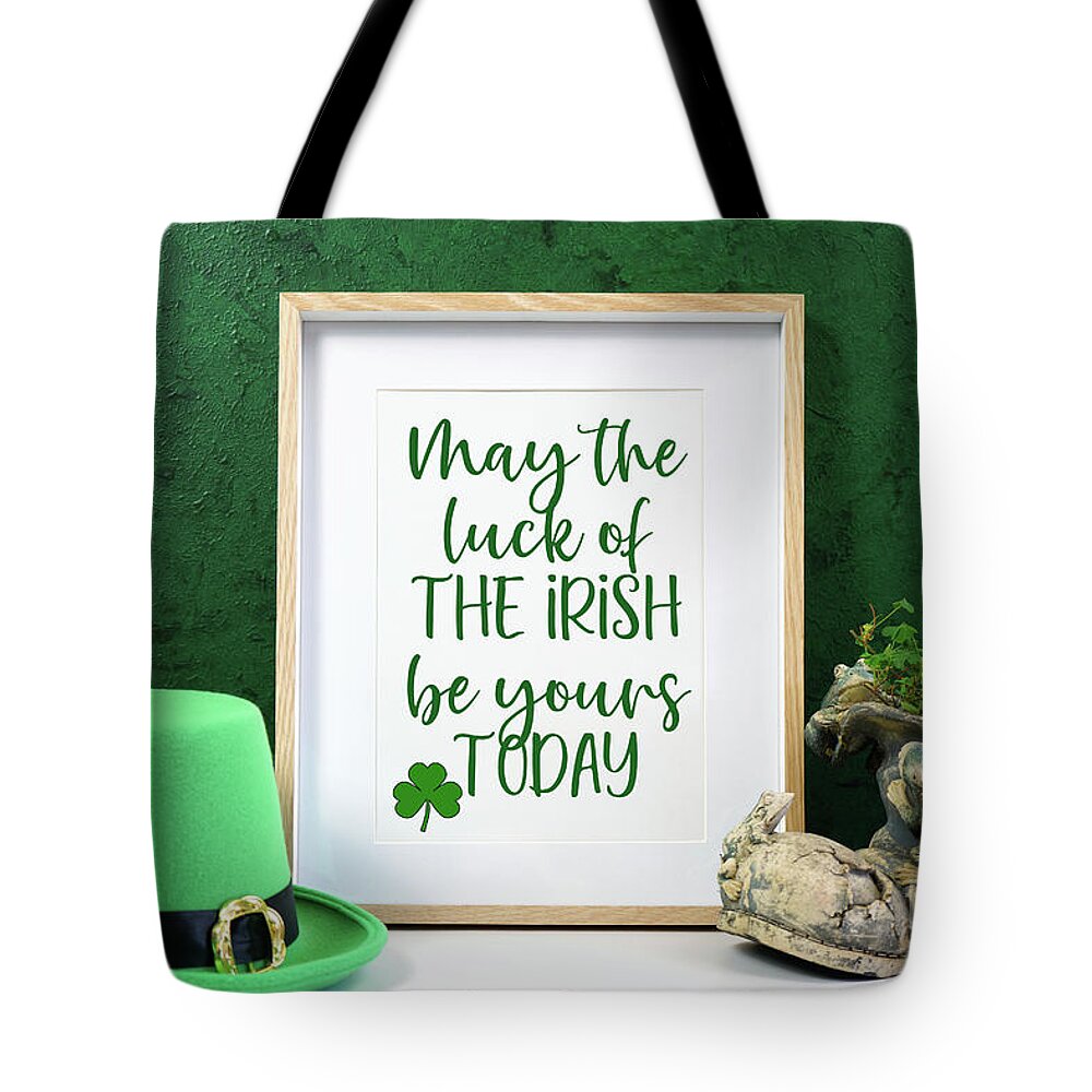 St Patrick Tote Bag featuring the photograph Happy St Patrick's Day wood border picture frame. by Milleflore Images