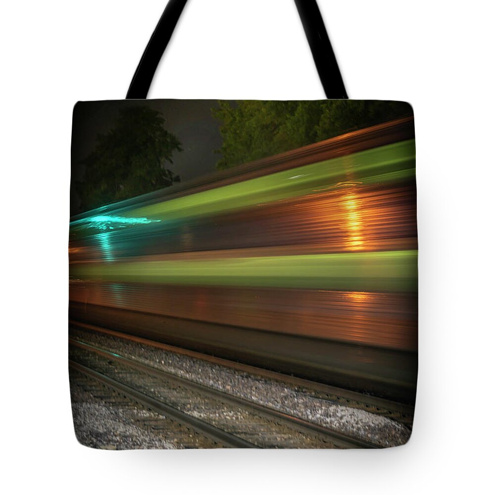 Metra Tote Bag featuring the photograph Heading Out or Heading In by Laura Hedien