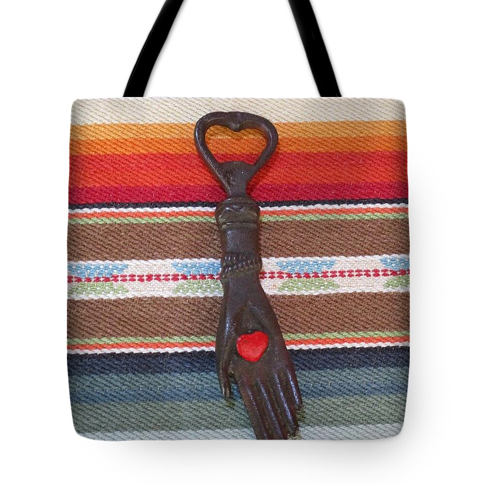 Heart Tote Bag featuring the photograph Heart in Hand by Gia Marie Houck