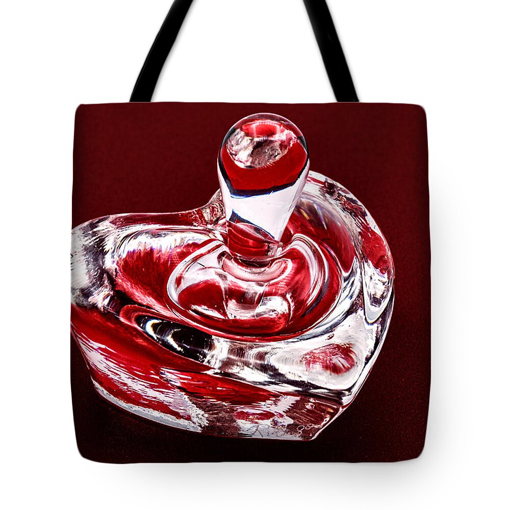 Bottle Tote Bag featuring the photograph Heart Shaped Glass Perfume Bottle - Red by Stuart Litoff