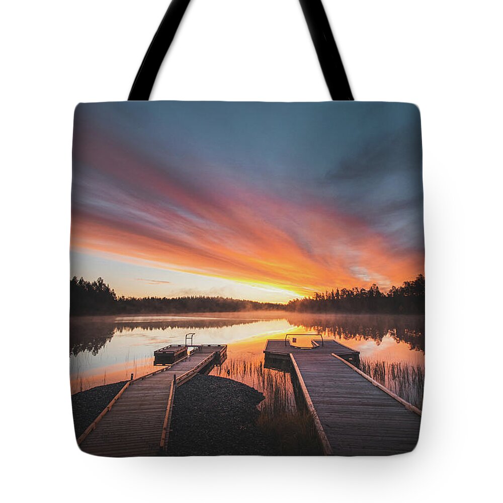 Lake Jatkonjärvi Tote Bag featuring the photograph Hell on a Finnish lake by Vaclav Sonnek