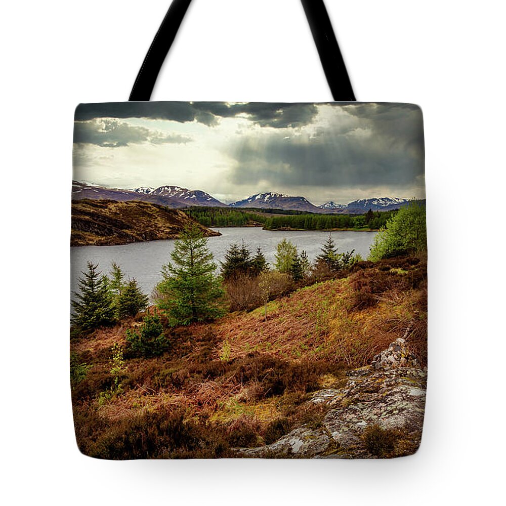 Scotland Tote Bag featuring the photograph Highland breaking storm by Bradley Morris
