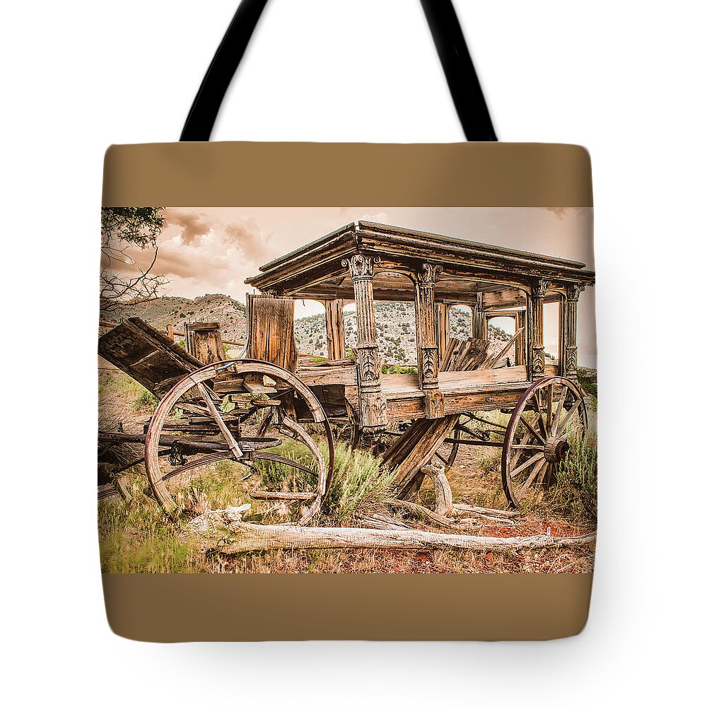 Horsedrawn Tote Bag featuring the photograph Horse Drawn Hearse in Virginia City by Ron Long Ltd Photography
