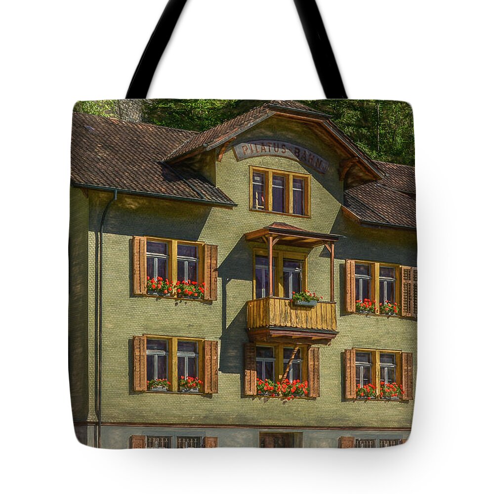 Switzerland Tote Bag featuring the photograph Iconic Swiss Style by Marcy Wielfaert