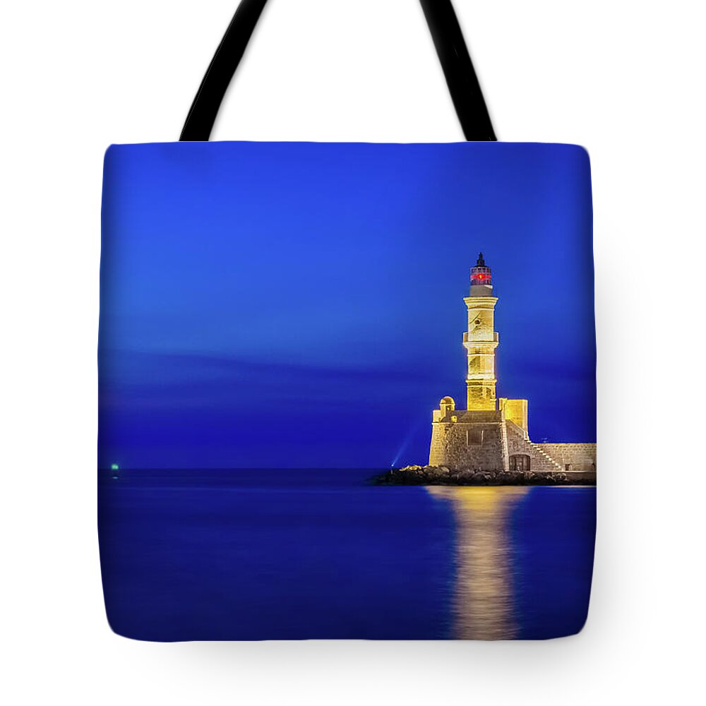 Lighthouse Tote Bag featuring the photograph Illuminated lighthouse of Chania by Alexios Ntounas