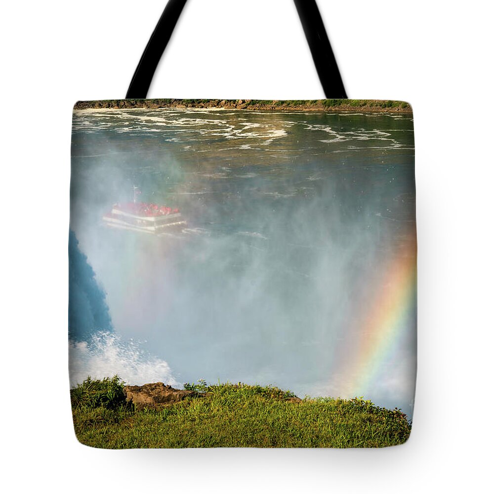 Niagara Falls Tote Bag featuring the photograph In the midst and mist by Izet Kapetanovic