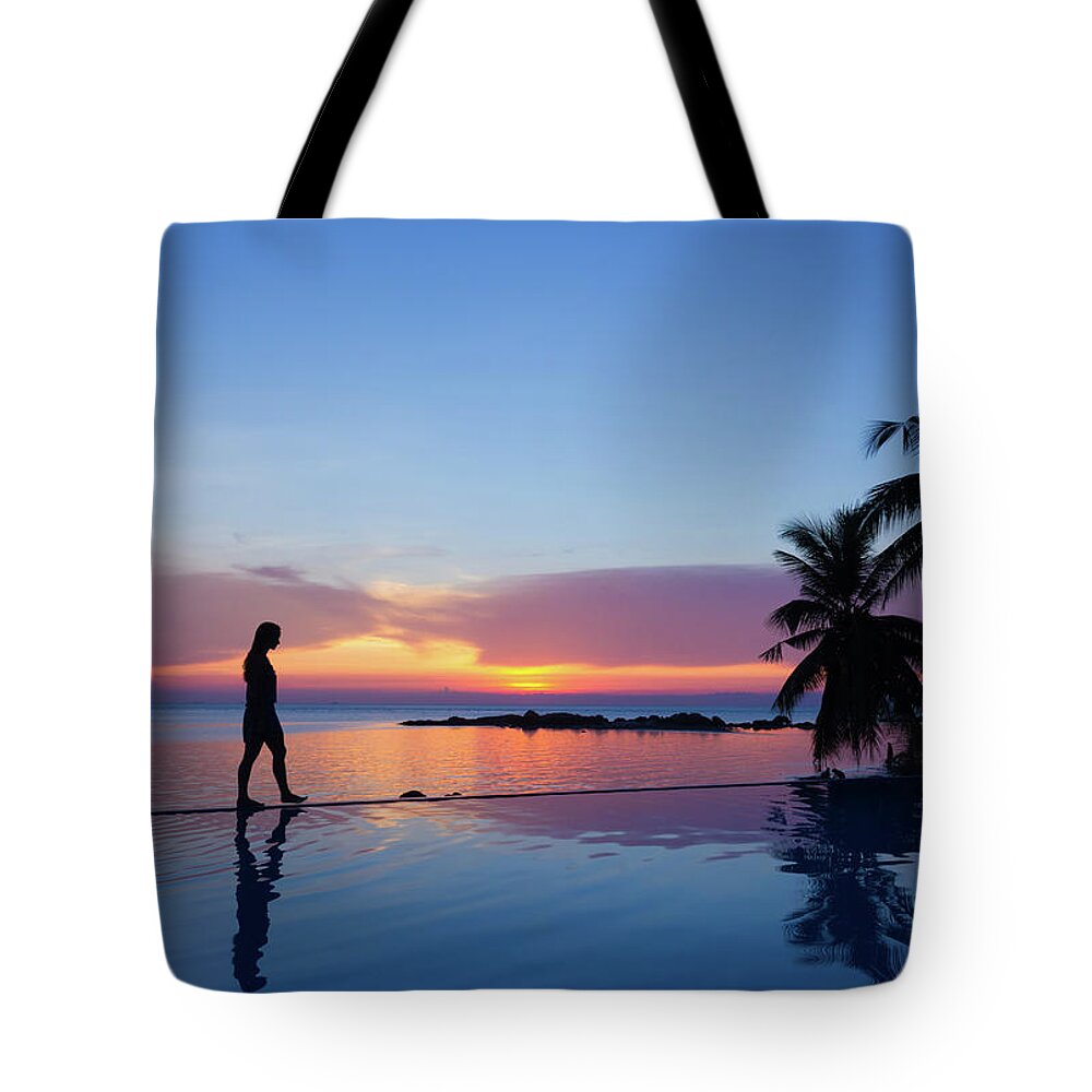 Beauty Tote Bag featuring the photograph Infinity Sunset Walk by Josu Ozkaritz