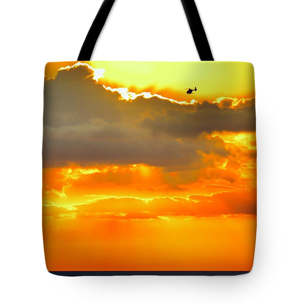 Flying Tote Bag featuring the photograph Into the Sun by Sarah Lilja