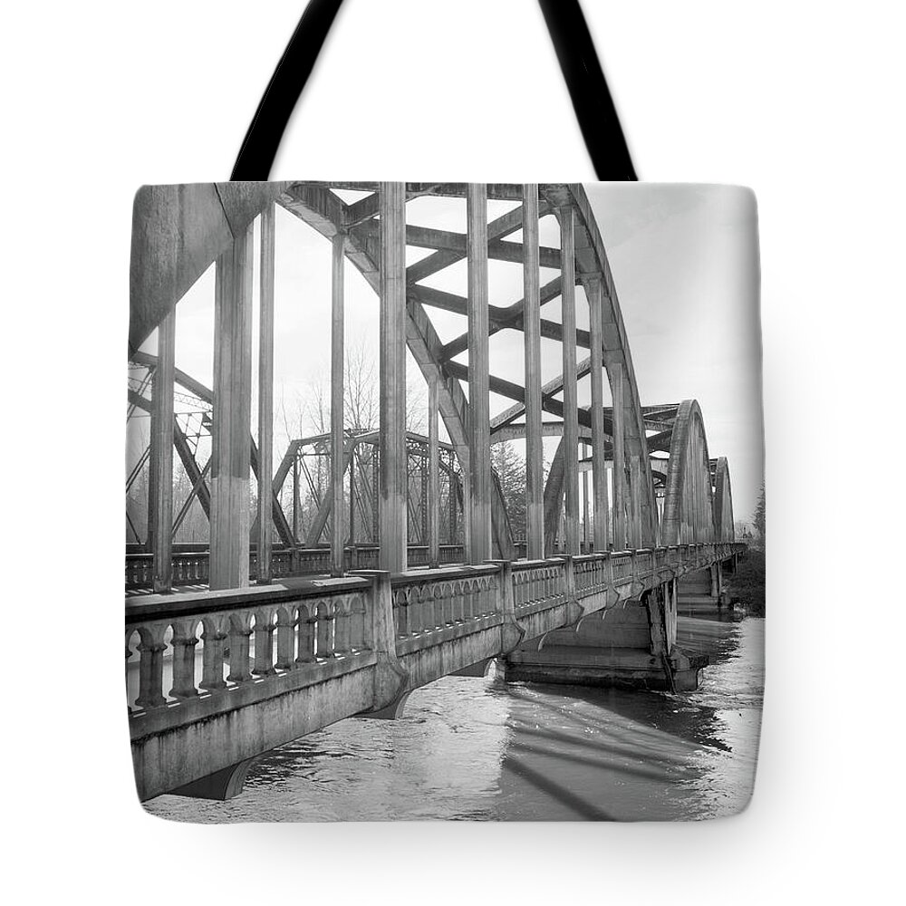Jefferson Bridge Tote Bag featuring the pyrography Jefferson Bridge, OR by Mike Bergen