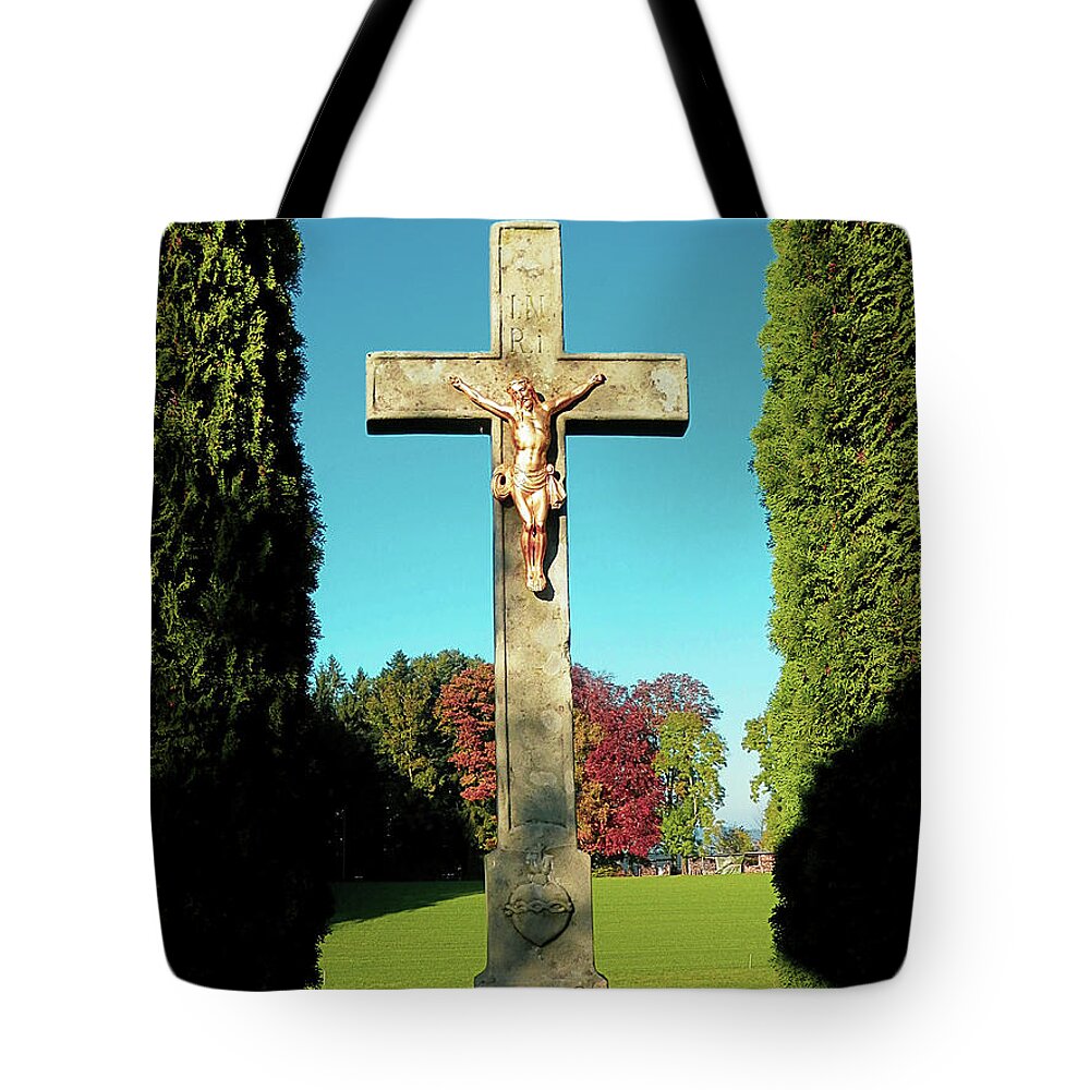 Jesus Tote Bag featuring the photograph Jesus On Cross Kapelle Ave Maria Switzerland by Claudia Zahnd-Prezioso