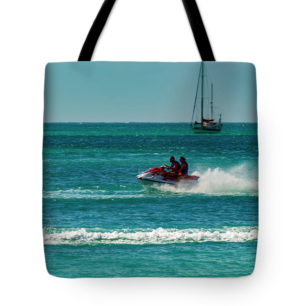 Water; Color; Boats; Travel; Sport; Skies Tote Bag featuring the photograph Jet Skiing by AE Jones