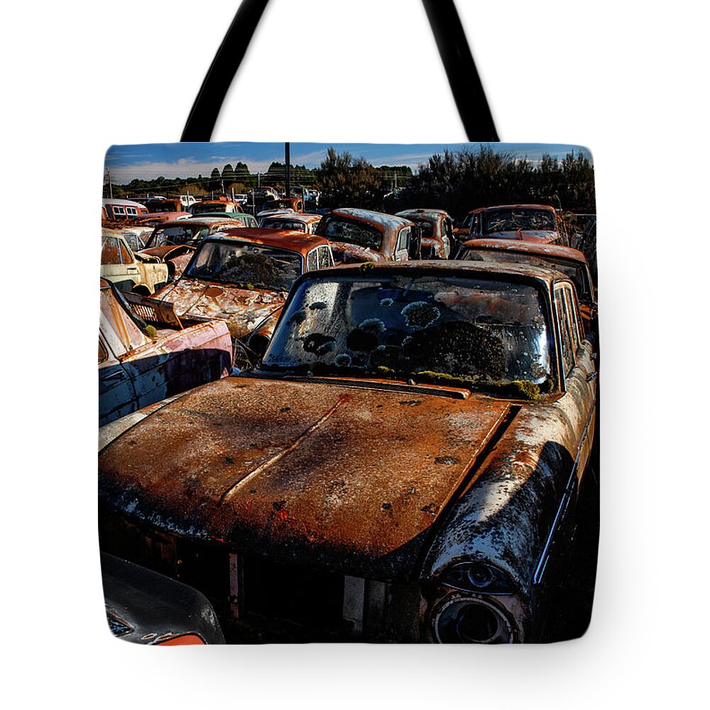 Wrecking Yard Tote Bag featuring the photograph The Junkyard Diaries VI - Smash Palace, North Island. New Zealand by Earth And Spirit