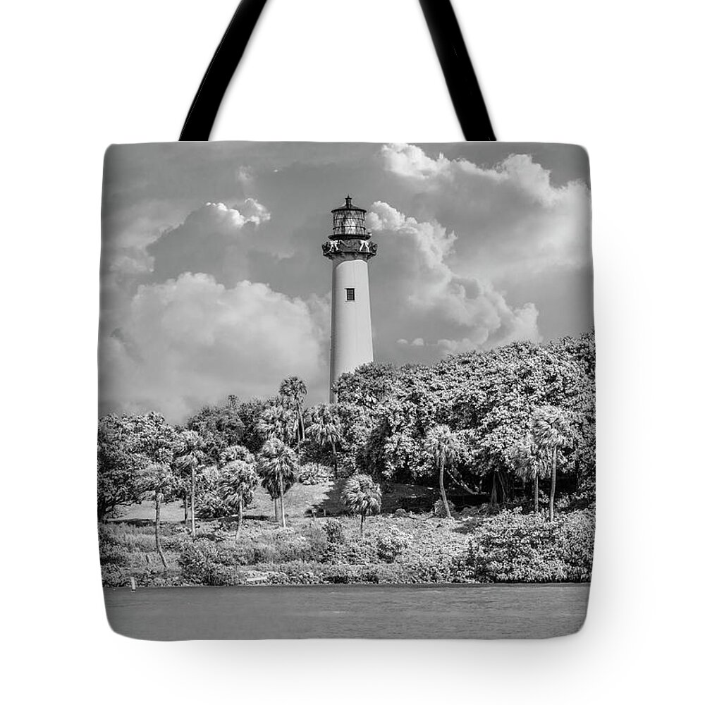 Black Tote Bag featuring the photograph Jupiter Lighthouse on Christmas Eve Black and White by Debra and Dave Vanderlaan