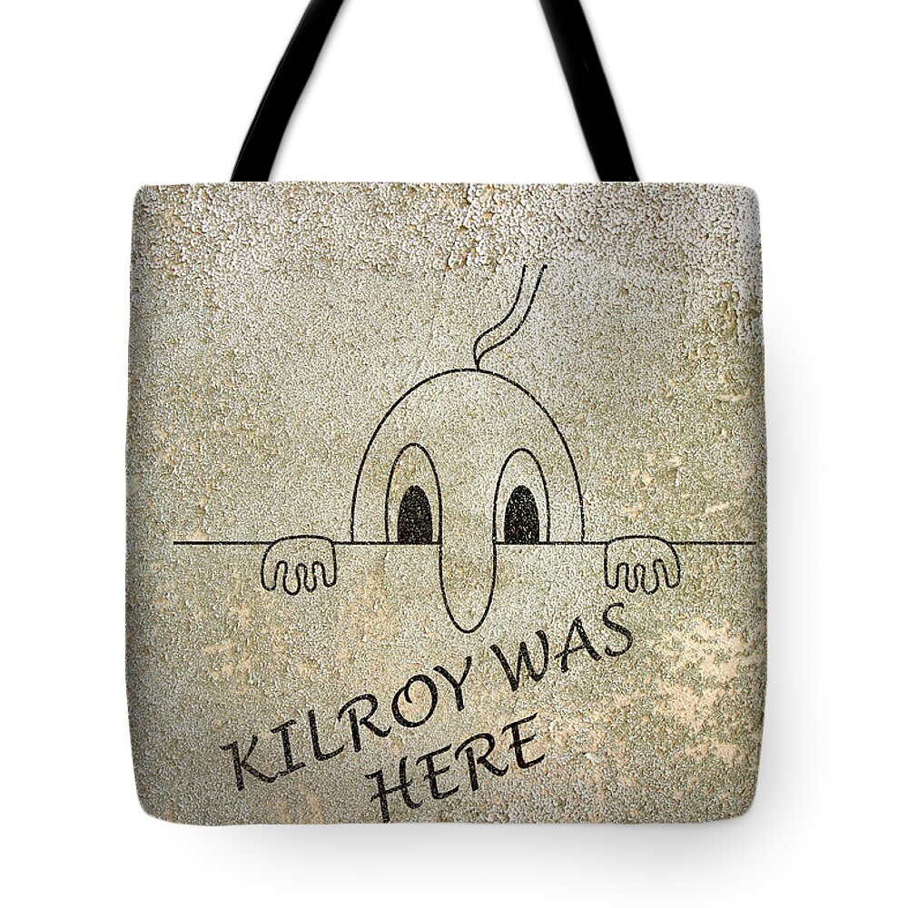 Kilroy Was Here Tote Bag featuring the photograph Kilroy was here on grunge concrete wall by Karen Foley