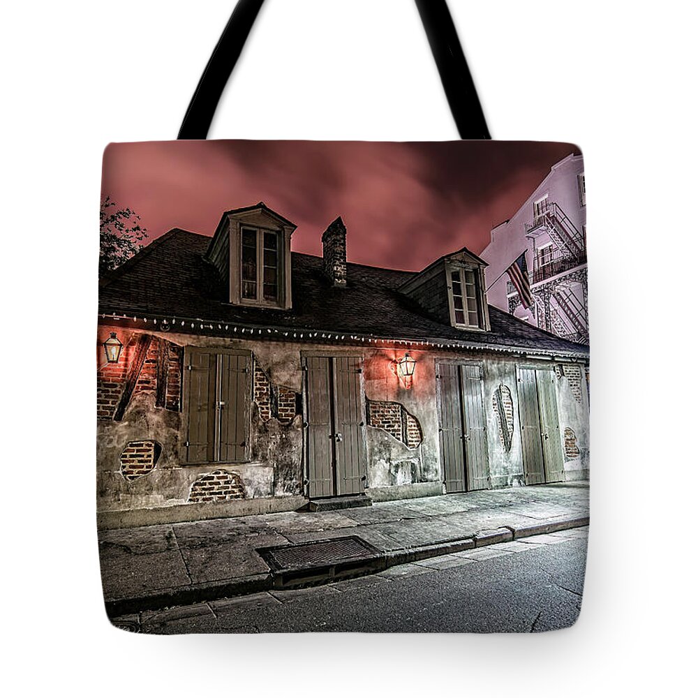 Andy Crawford Tote Bag featuring the photograph Lafitte's Blacksmith Shop by Andy Crawford