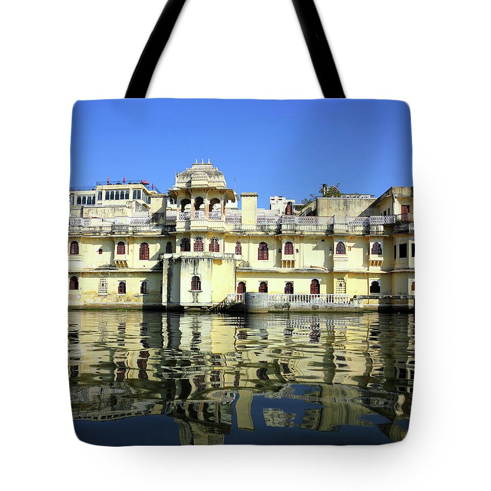 India Tote Bag featuring the photograph lake and palaces in Udaipur India by Mikhail Kokhanchikov