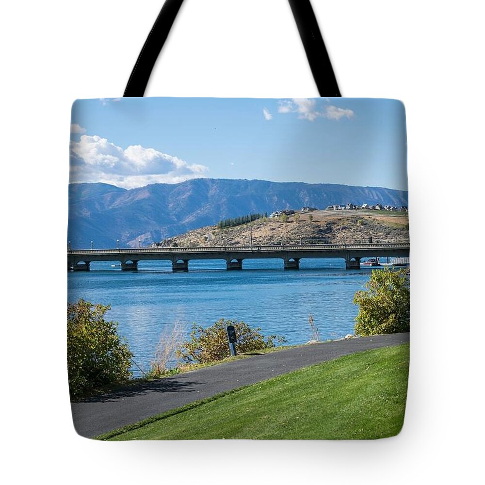 Lake Chelan Bridge Tote Bag featuring the photograph Lake Chelan Bridge by Tom Cochran