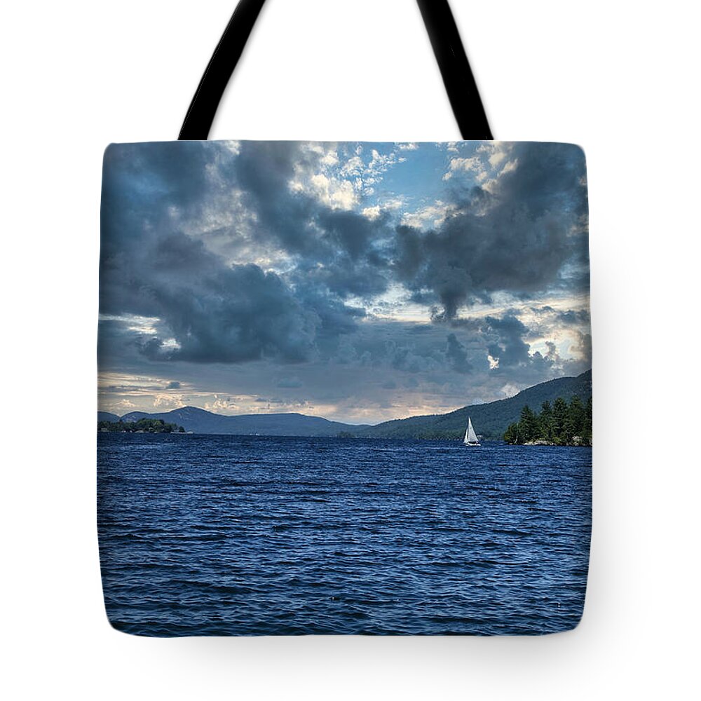 Boat Tote Bag featuring the photograph Lake George Sailboat and Storm Clouds by Russel Considine