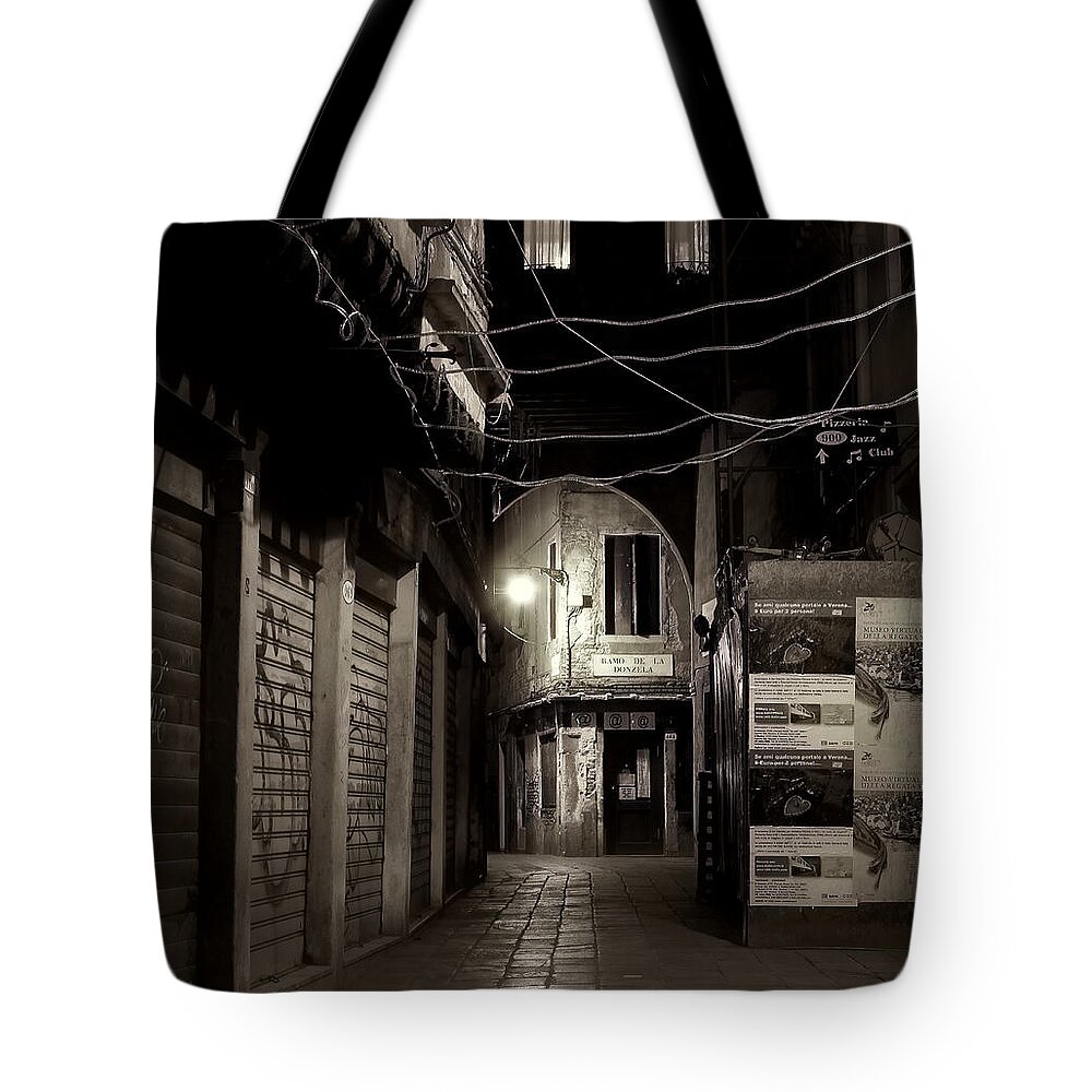 Monochromatic Tote Bag featuring the photograph Light in the Darkness by Eyes Of CC