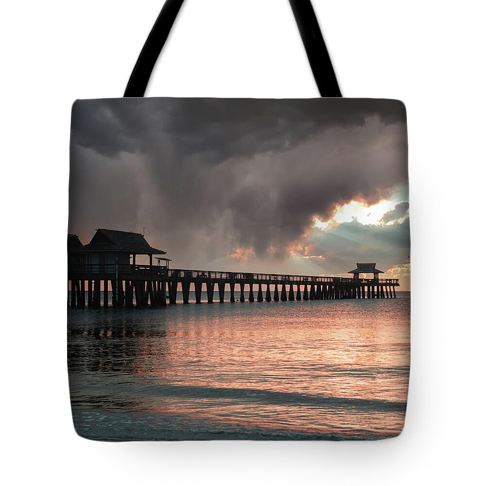Florida Tote Bag featuring the photograph Light On The Pier by Ed Taylor