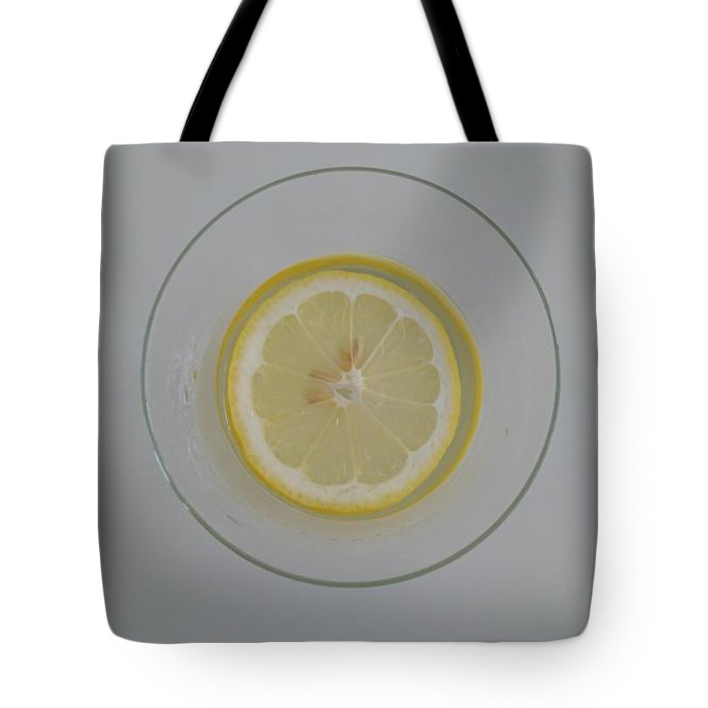 Lemon Tote Bag featuring the photograph Lime water by Faa shie