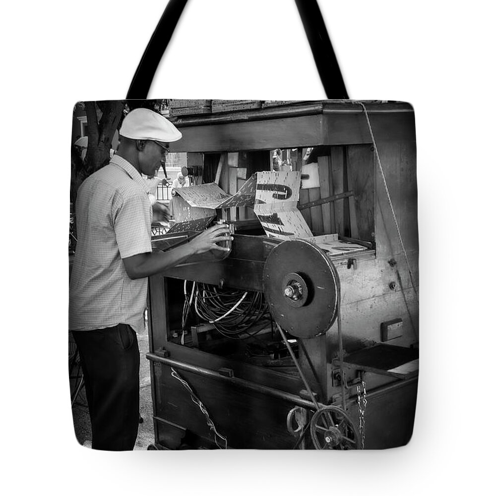 Manovela Music Tote Bag featuring the photograph Loading the street organ by Micah Offman