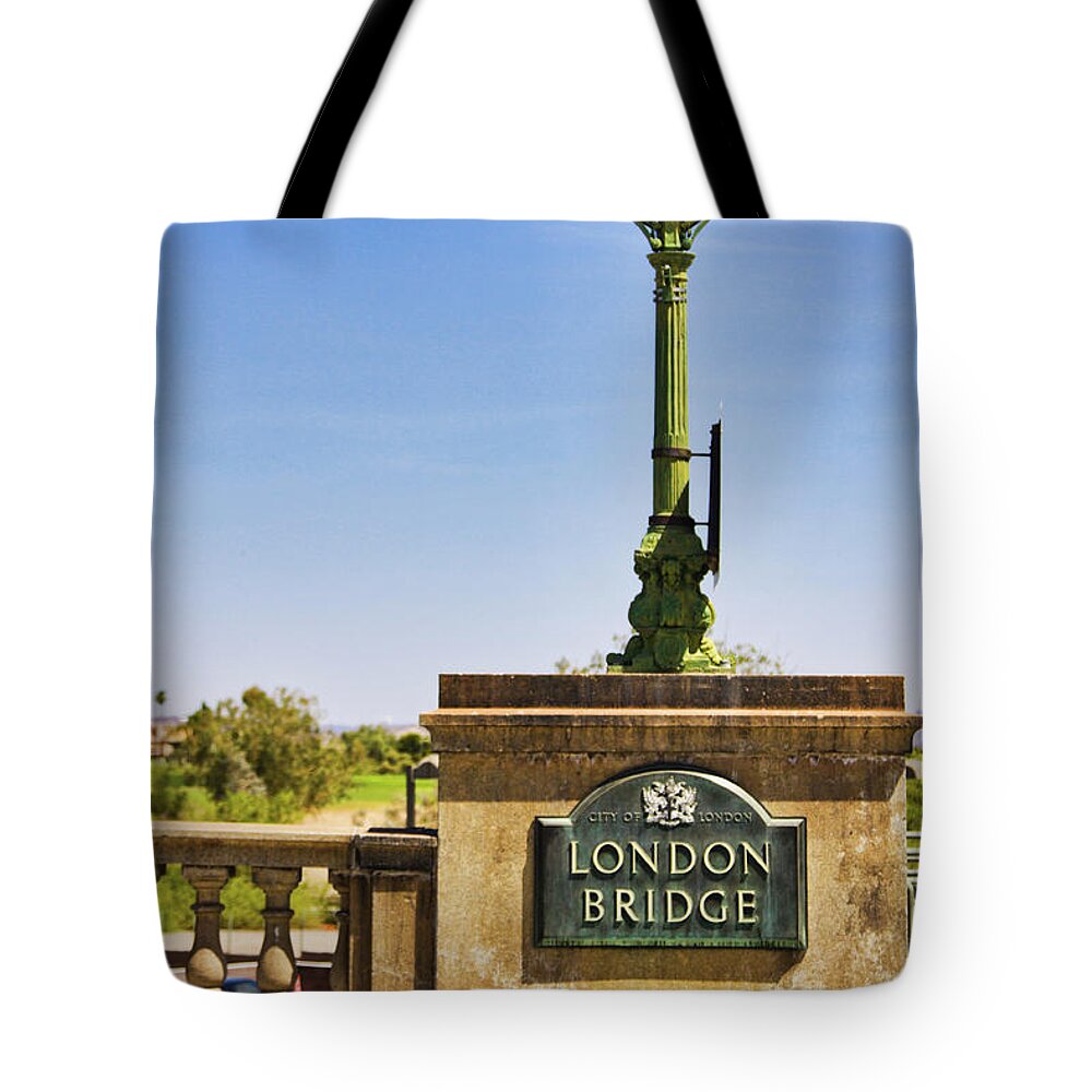 London Bridge Tote Bag featuring the photograph London Bridge original sign, Arizona by Tatiana Travelways