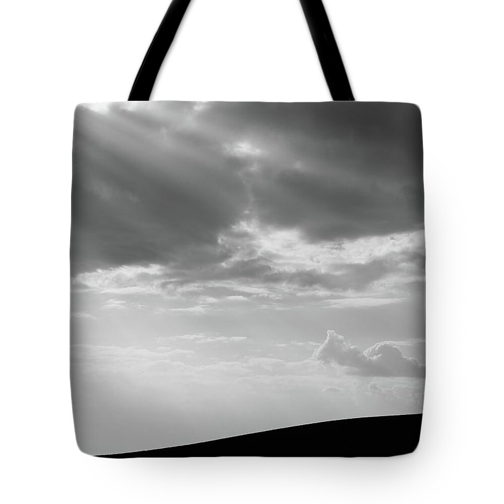 Black And White Tote Bag featuring the photograph Long trek home by Stephen Holst