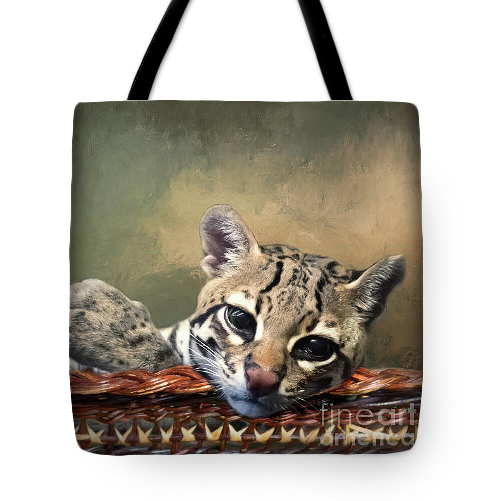Cincinnati Zoo Tote Bag featuring the photograph Lounging Ocelot by Ed Taylor