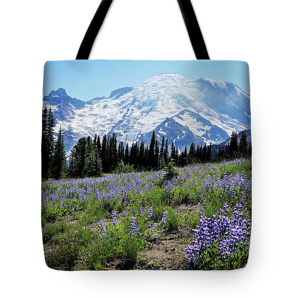 Rainier Tote Bag featuring the photograph lupine fields at Rainier by Sylvia Cook