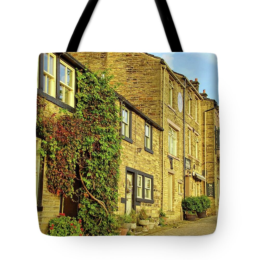Haworth Tote Bag featuring the photograph Main Street, Haworth, West Yorkshire by David Birchall