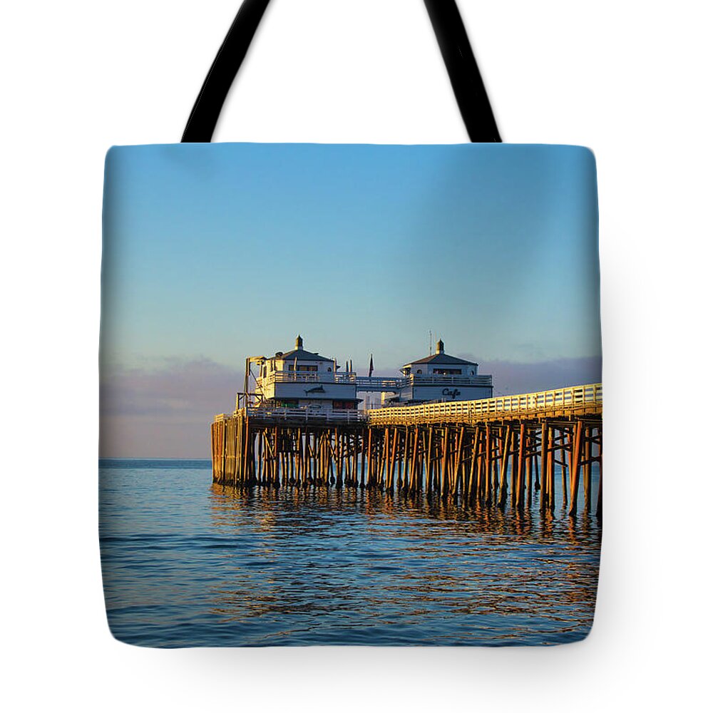 Beach Sunrise Tote Bag featuring the photograph Malibu Pier Morning by Matthew DeGrushe