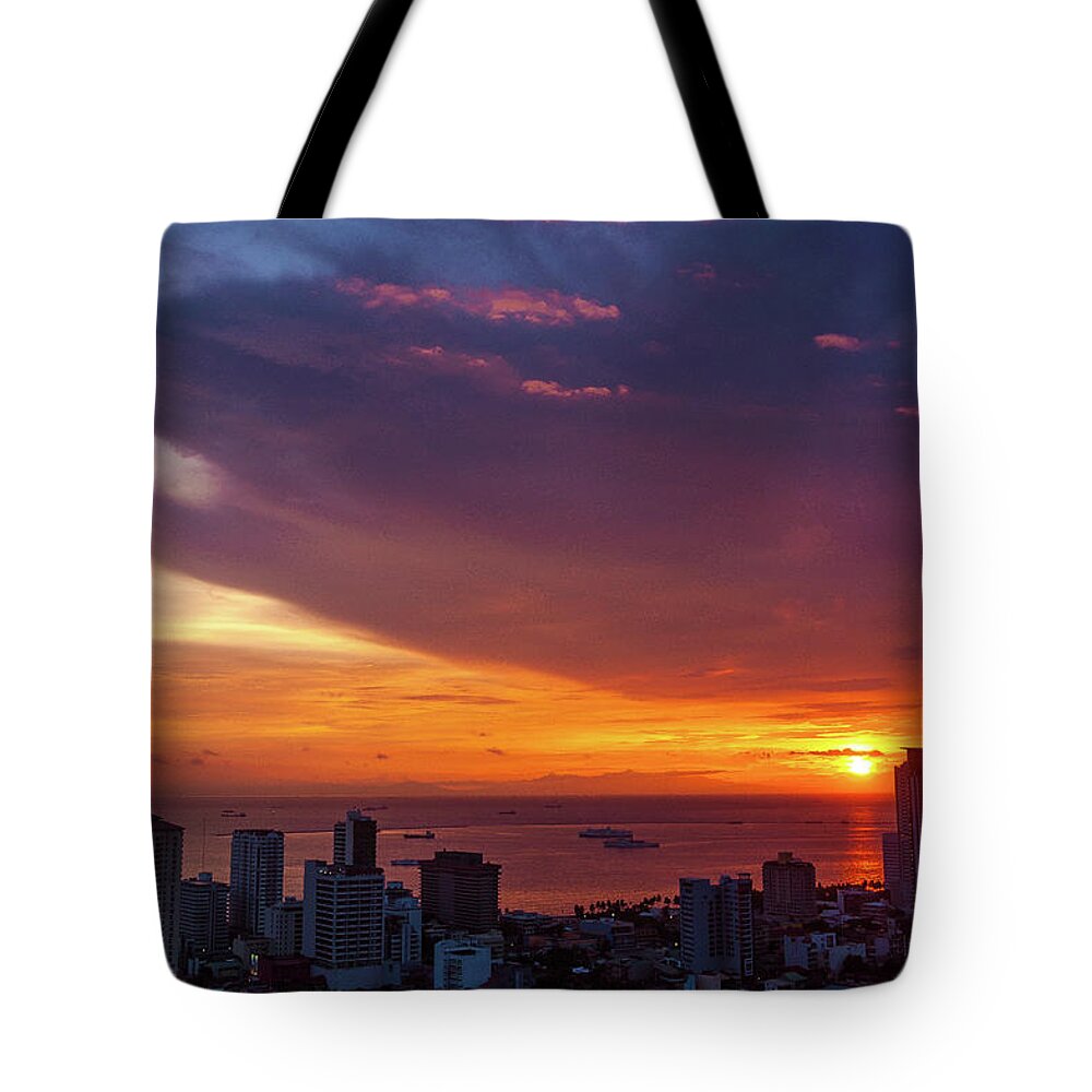 Philippines Tote Bag featuring the photograph Manila Sunset Cityscape by Arj Munoz
