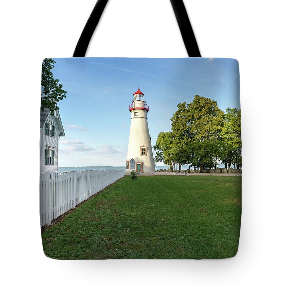 Marblehead Tote Bag featuring the photograph Marblehead Lighthouse and White Picket Fence by Marianne Campolongo